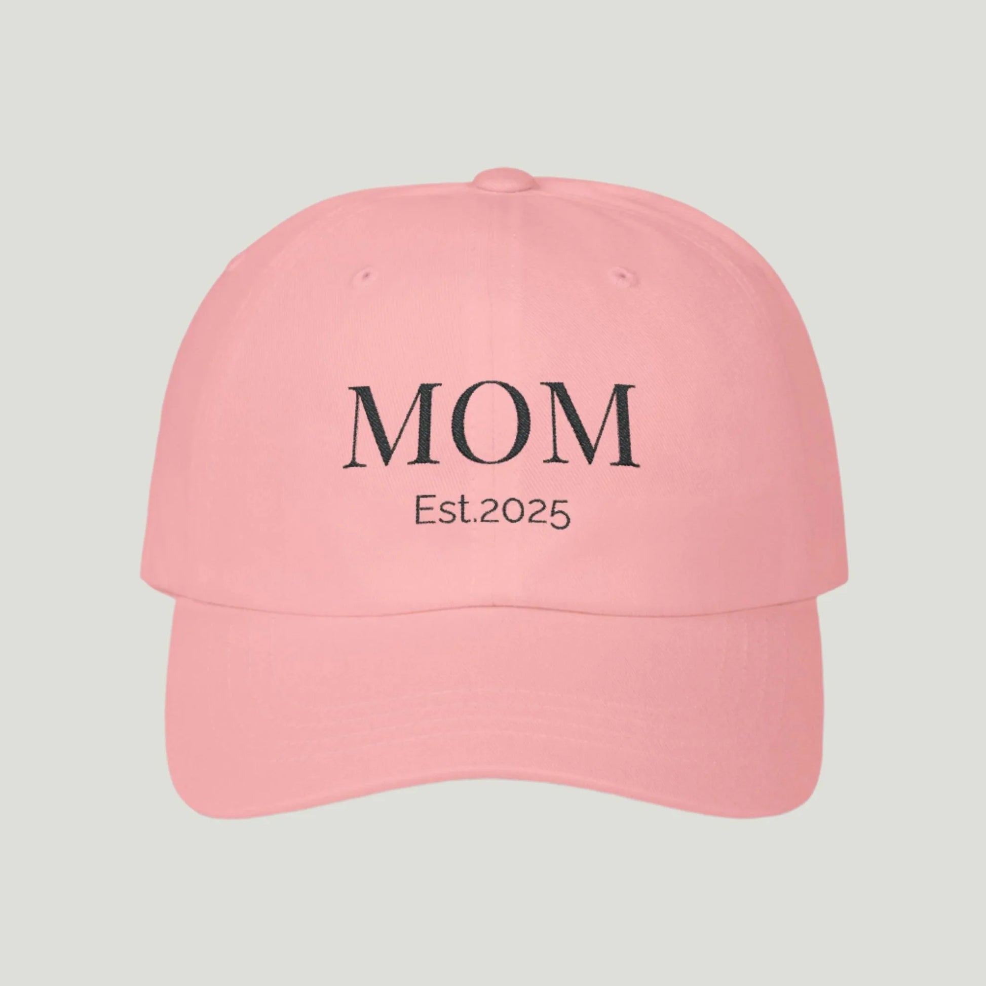 Classic Mom Cap in pink color, featuring a stylish embroidered 'Mom' design in black thread, perfect for celebrating motherhood and announcing pregnancy.