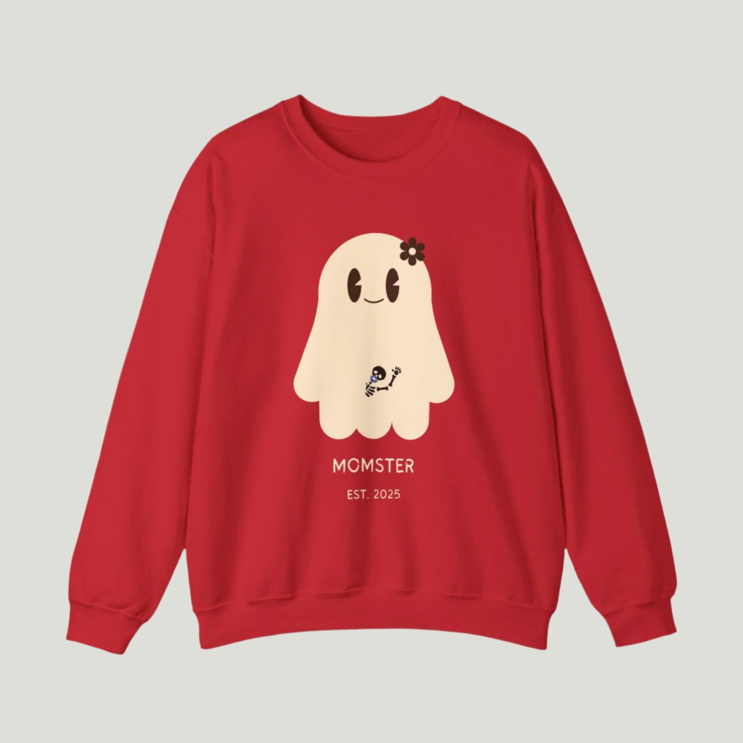 Cute Ghost Momster Sweatshirt in red color featuring an adorable illustration of a ghost with a skeleton holding a pacifier, waving from the belly. The design includes the text “Momster. Established 2025,” making it an ideal choice for announcing a pregnancy during Halloween celebrations. Perfect for a fun and festive reveal!