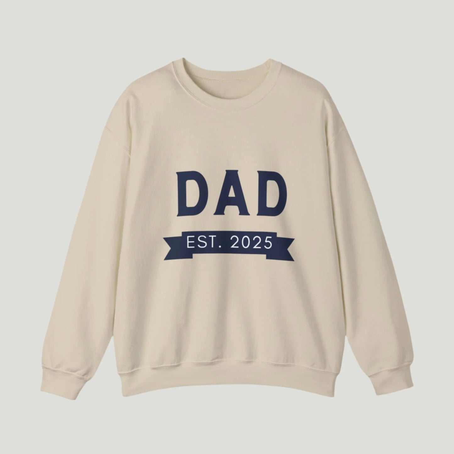 Sand color Dad Established 2025 Sweatshirt, perfect for announcing a pregnancy to dads-to-be. The design features bold text celebrating the exciting new role of fatherhood, making it a great gift for expectant dads.