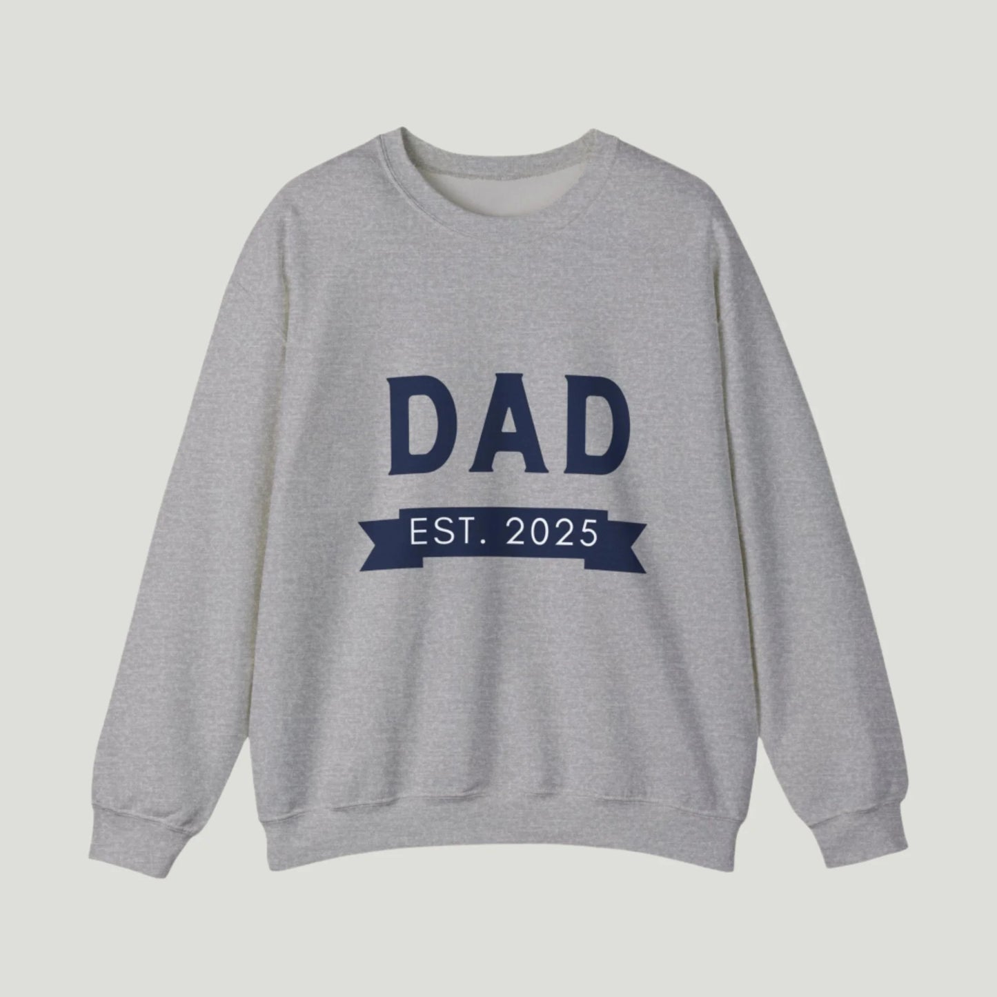 Sport Grey Dad Established 2025 Sweatshirt, perfect for announcing a pregnancy to dads-to-be. The design features bold text celebrating the exciting new role of fatherhood, making it a great gift for expectant dads.