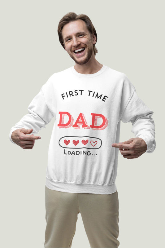 Man wearing white color First Time Dad Loading Sweatshirt featuring a playful loading bar adorned with hearts. Ideal for announcing pregnancy to expectant fathers, this cozy sweatshirt celebrates the exciting journey of becoming a dad for the first time!