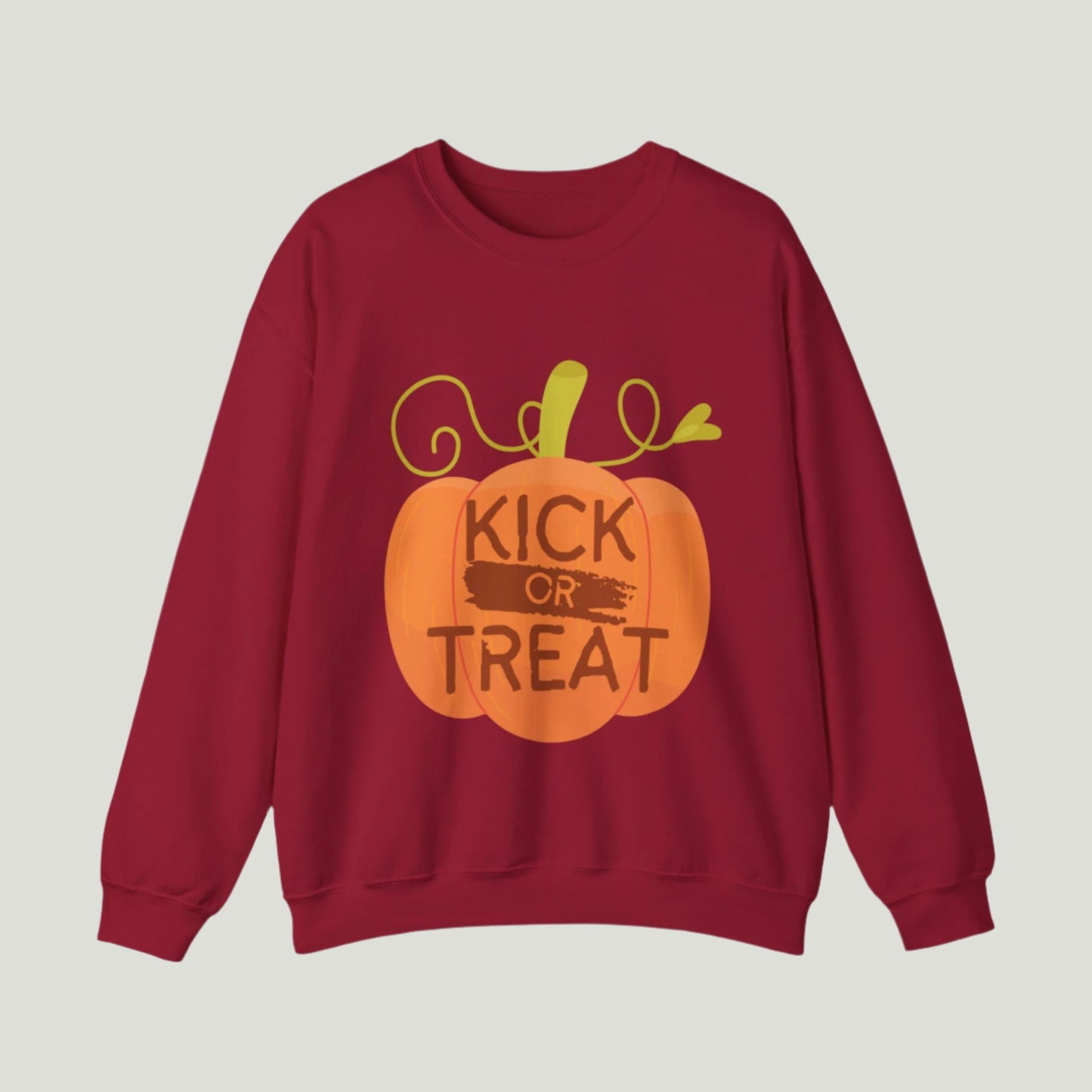 Cardinal red-colored Kick or Treat sweatshirt featuring playful text and a cute pumpkin graphic, perfect for celebrating Halloween and pregnancy announcements.