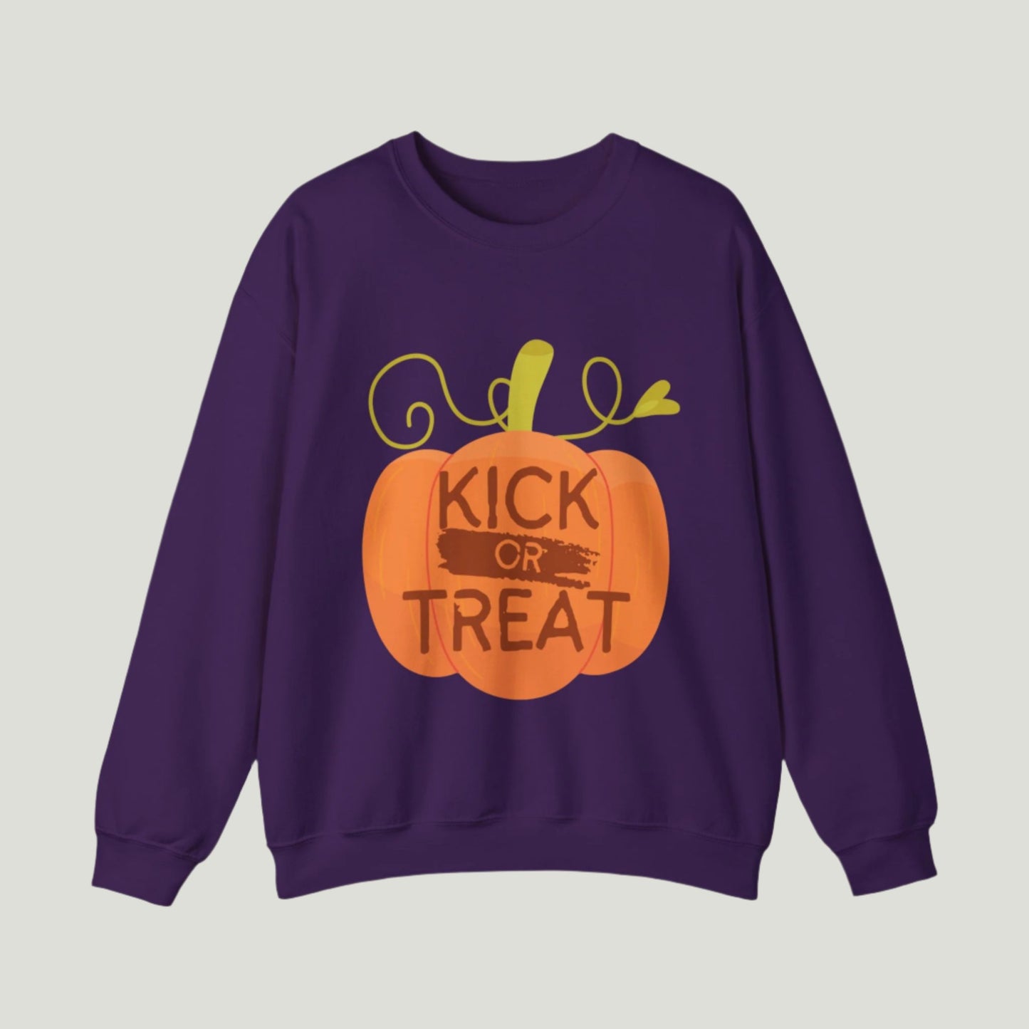 Purple-colored Kick or Treat sweatshirt featuring playful text and a cute pumpkin graphic, perfect for celebrating Halloween and pregnancy announcements.