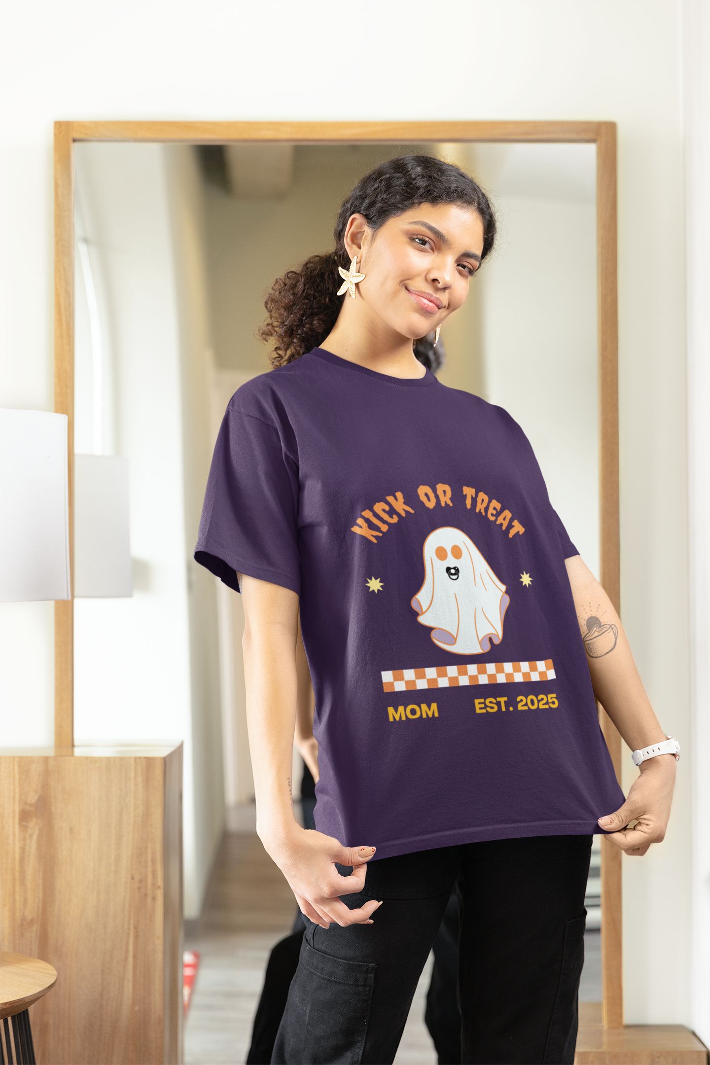 Purple "Kick or Treat" T-shirt featuring a cute ghost with a pacifier and the text "Mom, Established 2025," perfect for pregnancy announcements.