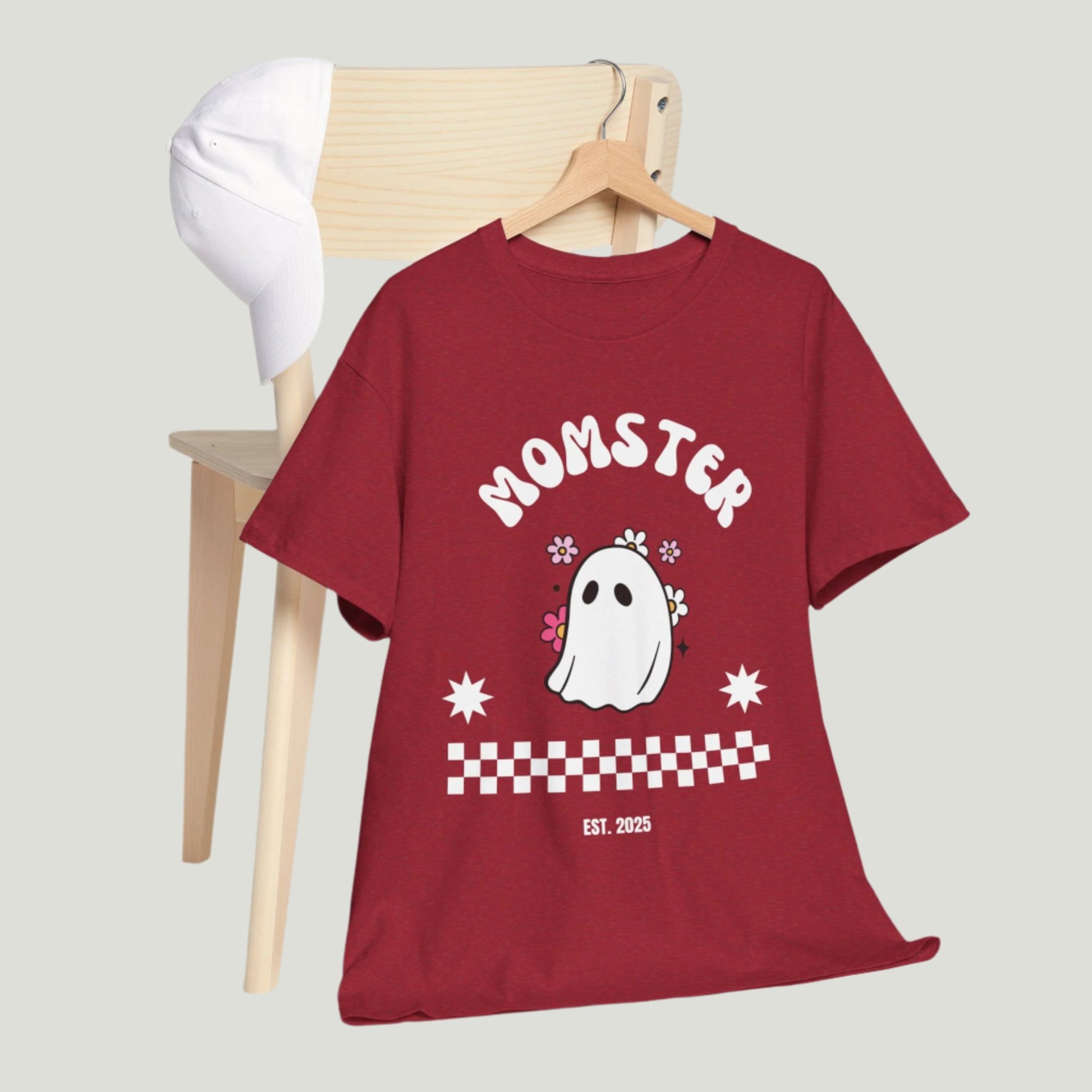 Momster T-Shirt in cherry red color featuring a cute ghost graphic in the center and the text 'Established 2025,' perfect for announcing a pregnancy during Halloween
