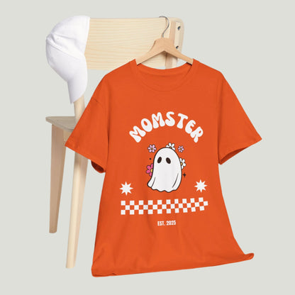 Momster T-Shirt in orange color featuring a cute ghost graphic in the center and the text 'Established 2025,' perfect for announcing a pregnancy during Halloween
