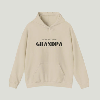 Sand sweatshirt with black text reading "The Best Is Yet To Come GRANDPA," perfect for announcing a pregnancy to soon-to-be grandparents.